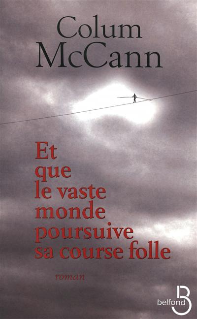 Et que le vaste monde poursuive sa... - COLUM MCCANN