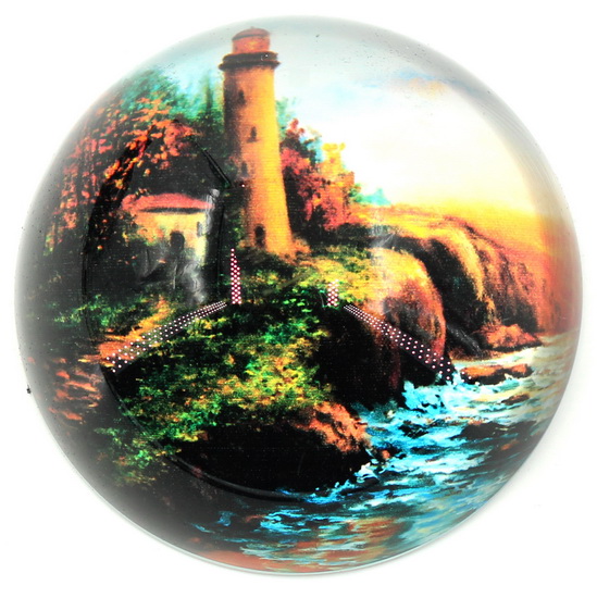 Presse-papier phare au bord de l'eau